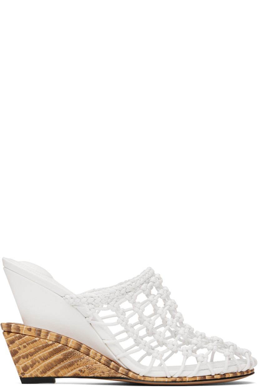 Hand-woven buffed lambskin mules in white and beige.

· Padded logo-embossed lambskin footbed 
· Modified wedge heel with rubber injection 
· Sculptural snakeskin-embossed leather midsole
· Leather sole 
· Heel: H4"

Part of the La Croisière collection. 

Supplier color: Off-white/Beige