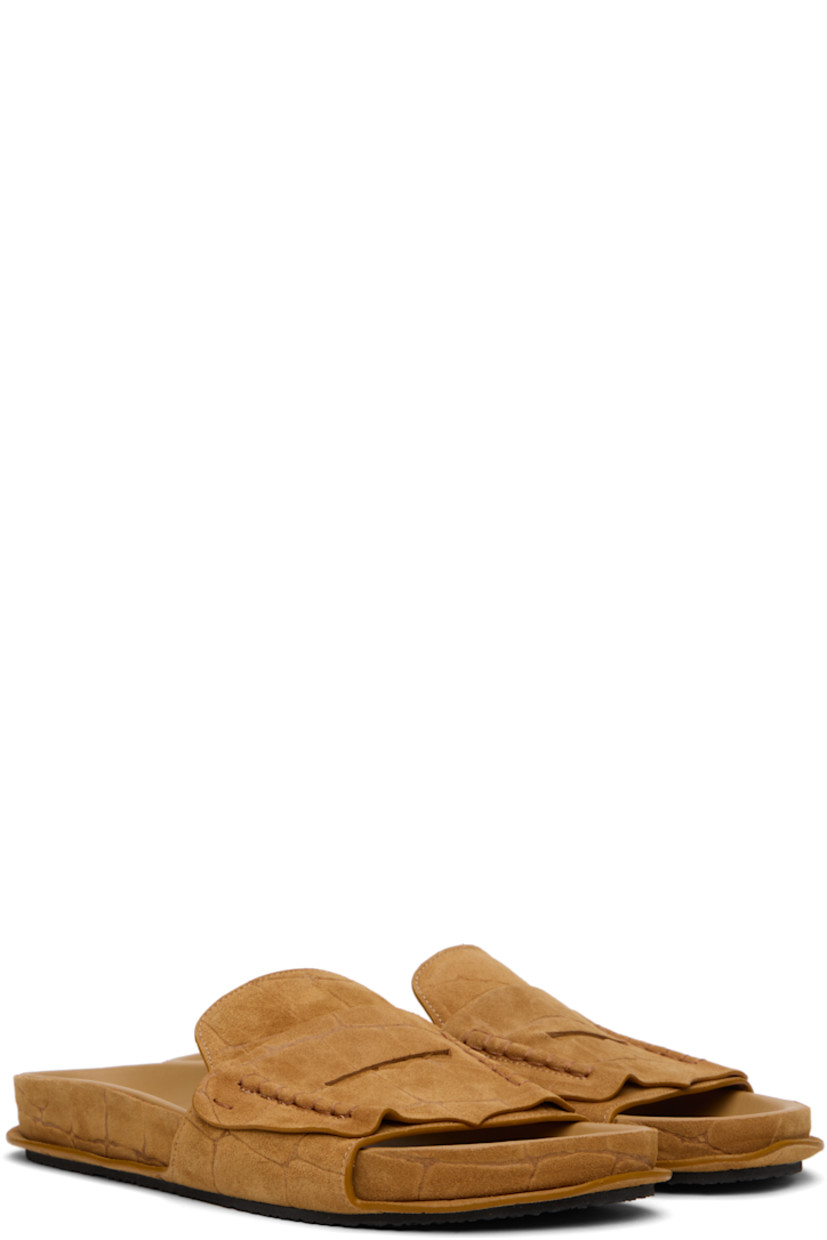 Croc-embossed suede flat sandals.

· Hand-stitched detailing throughout
· Open toe
· Strap with cutout at vamp
· Logo-embossed molded lambskin footbed
· Crêpe-rubber sole

Supplier color: Camel