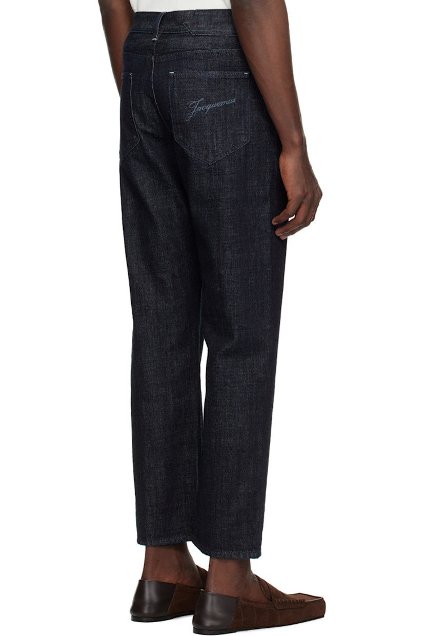 Straight-leg non-stretch denim jeans. 

· Mid-rise
· Belt loops
· Five-pocket styling
· Button fly
· Laser-printed logo at back pocket
· Logo-engraved silver-tone hardware
· Contrast stitching in white

Part of the La Croisière collection.

Supplier color: Dark navy