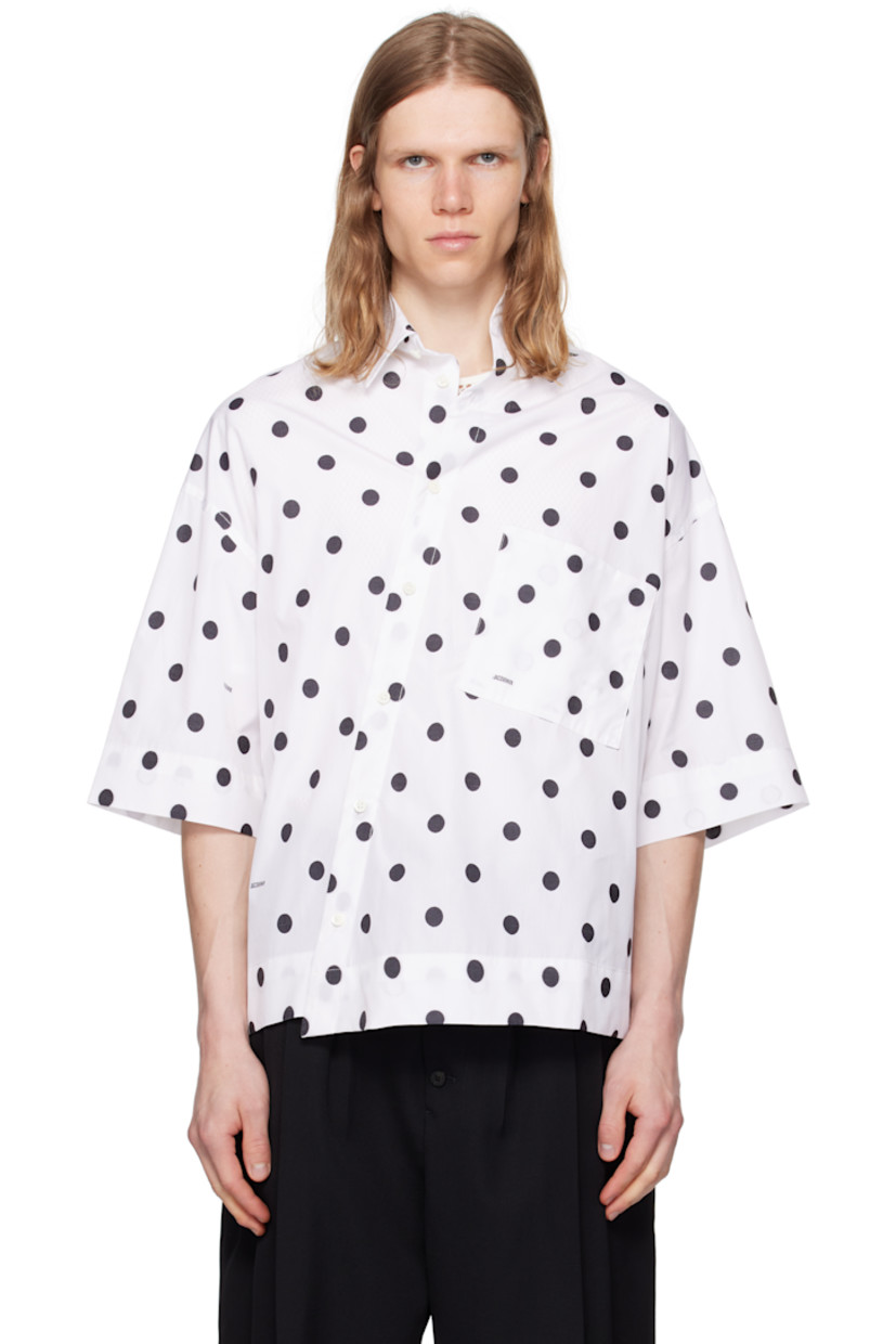Cotton poplin shirt. Jacquard polka-dot pattern throughout.

· Asymmetric construction
· Spread collar
· Offset button closure
· Patch pocket at chest
· Locker loop at back collar

Supplier color: Jacquard dots