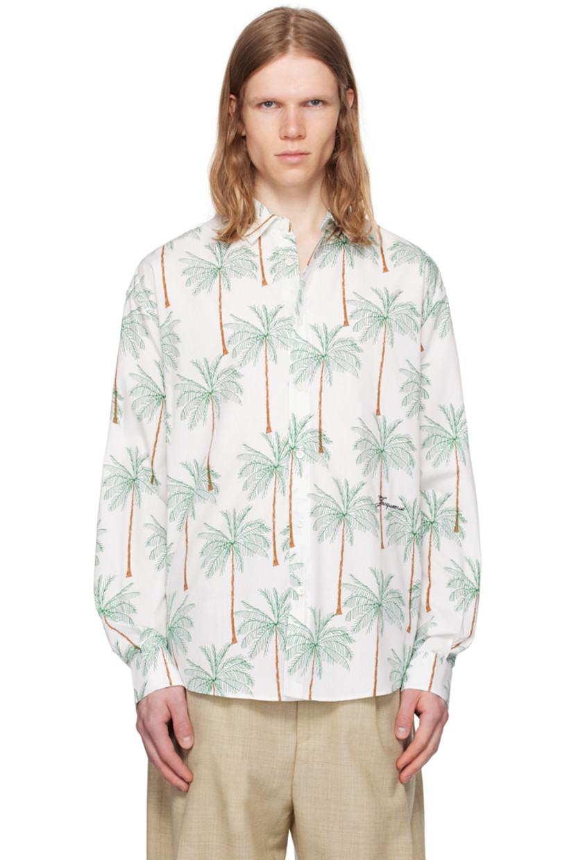 Cotton poplin shirt. Graphic pattern printed throughout.

· Spread collar
· Button closure
· Shirttail hem
· Buttoned barred cuffs
· Locker loop at back collar
· Pleats at back yoke
· Mother-of-pearl hardware

Part of the La Croisière collection.

Supplier color: Print palmtrees drawing white