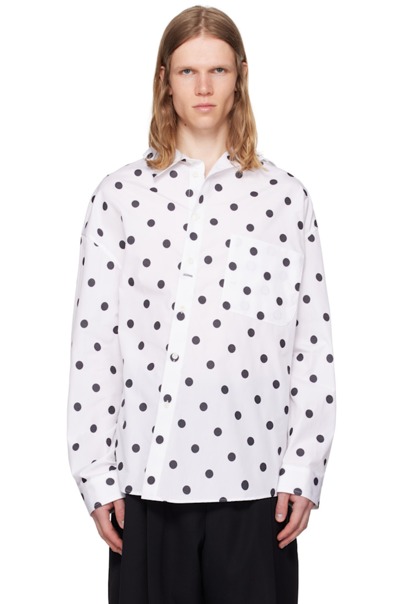 Cotton poplin shirt. Jacquard polka-dot pattern throughout.

· Asymmetric construction
· Spread collar
· Offset button closure
· Patch pocket at chest
· Shirttail hem
· Buttoned barrel cuffs
· Locker loop at back collar
· Mother-of-pearl hardware

Part of the La Croisière collection.

Supplier color: Jacquard dots