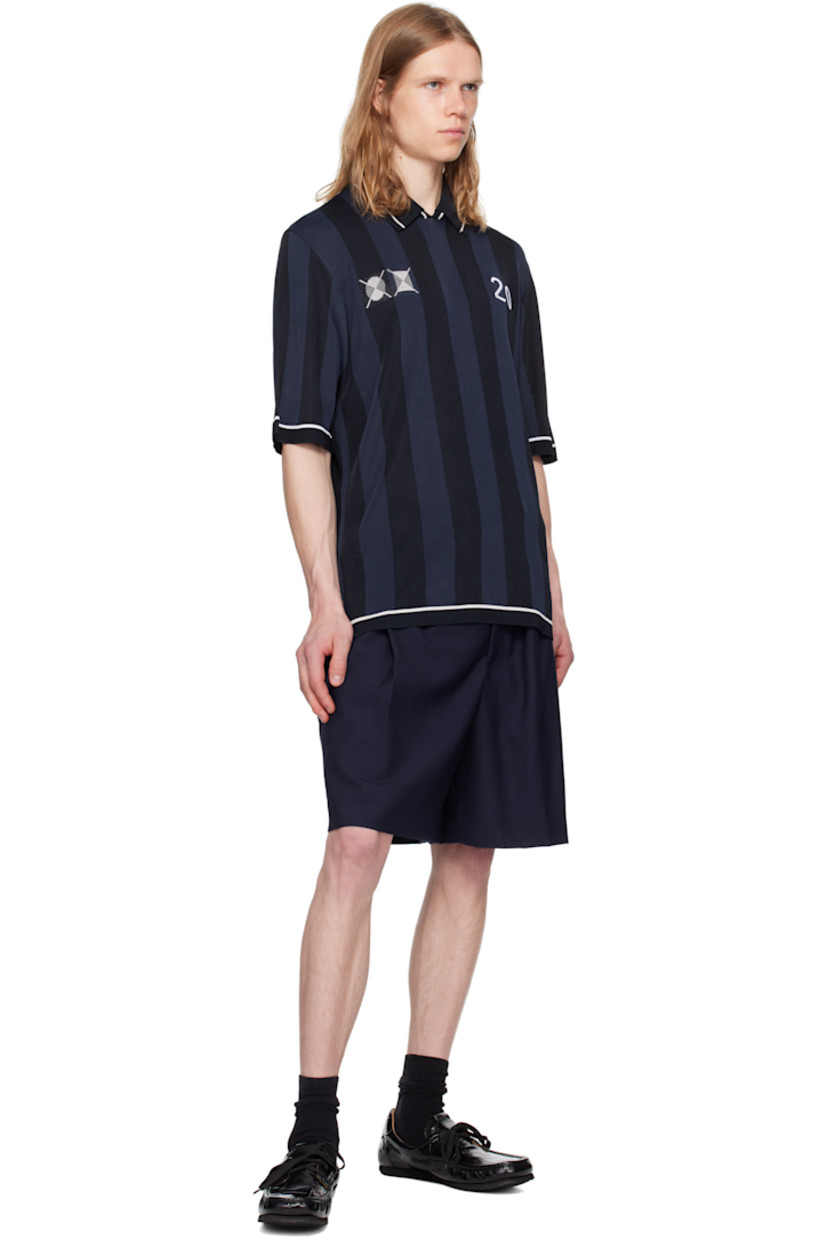 Knit stretch viscose-blend polo. Jacquard stripes throughout.

· Striped rib-knit spread collar, hem, and cuffs
· Jacquard graphic and embroidered text at chest
· Jacquard logo graphic at back

Part of the La Croisière collection.

Supplier color: Dark navy