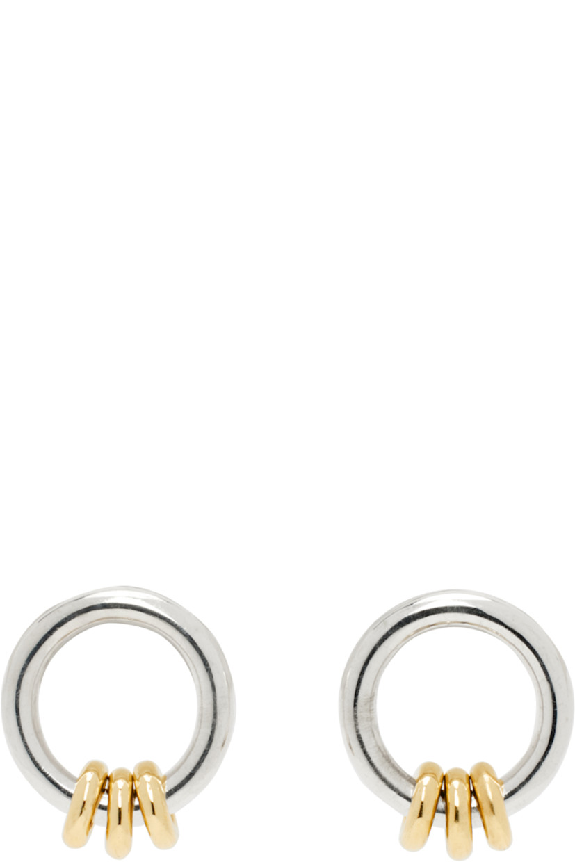 Pair of handcrafted stud earrings in sterling silver. 

· 18k gold O-rings at drop
· Post-stud fastening 
· D0.5"

Supplier color: 18k gold/Sterling silver