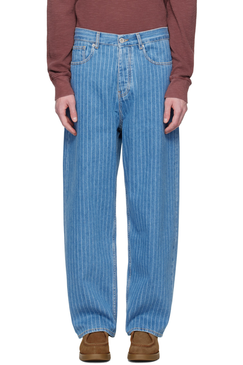 Loose-fit non-stretch denim jeans. Jacquard stripes and subtle fading throughout.

· Low-rise
· Belt loops
· Five-pocket styling
· Button fly
· Leather logo patch at back waistband
· Logo-engraved silver-tone hardware
· Contrast stitching in yellow

Supplier color: Light blue