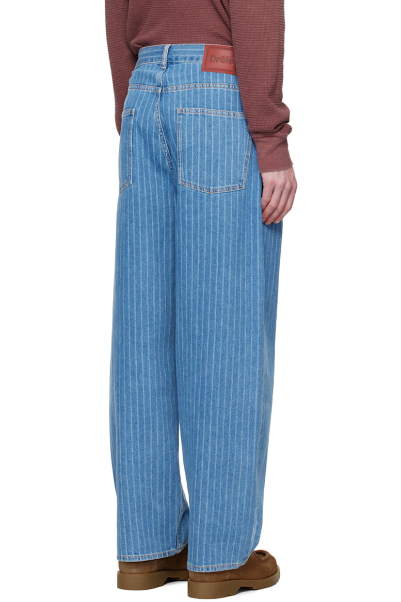 Loose-fit non-stretch denim jeans. Jacquard stripes and subtle fading throughout.

· Low-rise
· Belt loops
· Five-pocket styling
· Button fly
· Leather logo patch at back waistband
· Logo-engraved silver-tone hardware
· Contrast stitching in yellow

Supplier color: Light blue