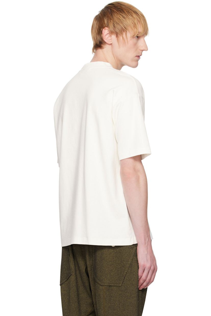 240 GSM cotton interlock jersey T-shirt.

· Rib-knit crewneck
· Graphic and logo printed at front
· Dropped shoulders

Supplier color: Off-White