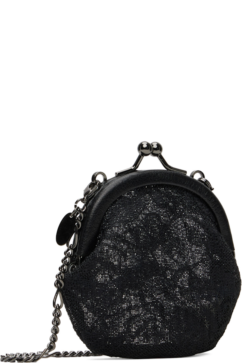 Rigid and sheer embroidered lace pouch.

· Grained leather trim throughout
· Detachable curb chain carry handle
· Detachable curb chain shoulder strap
· Kiss-lock closure
· Unlined 
· H3" x W3" x D0.75"

Part of the discord YOHJI YAMAMOTO collection.

Supplier color: Black