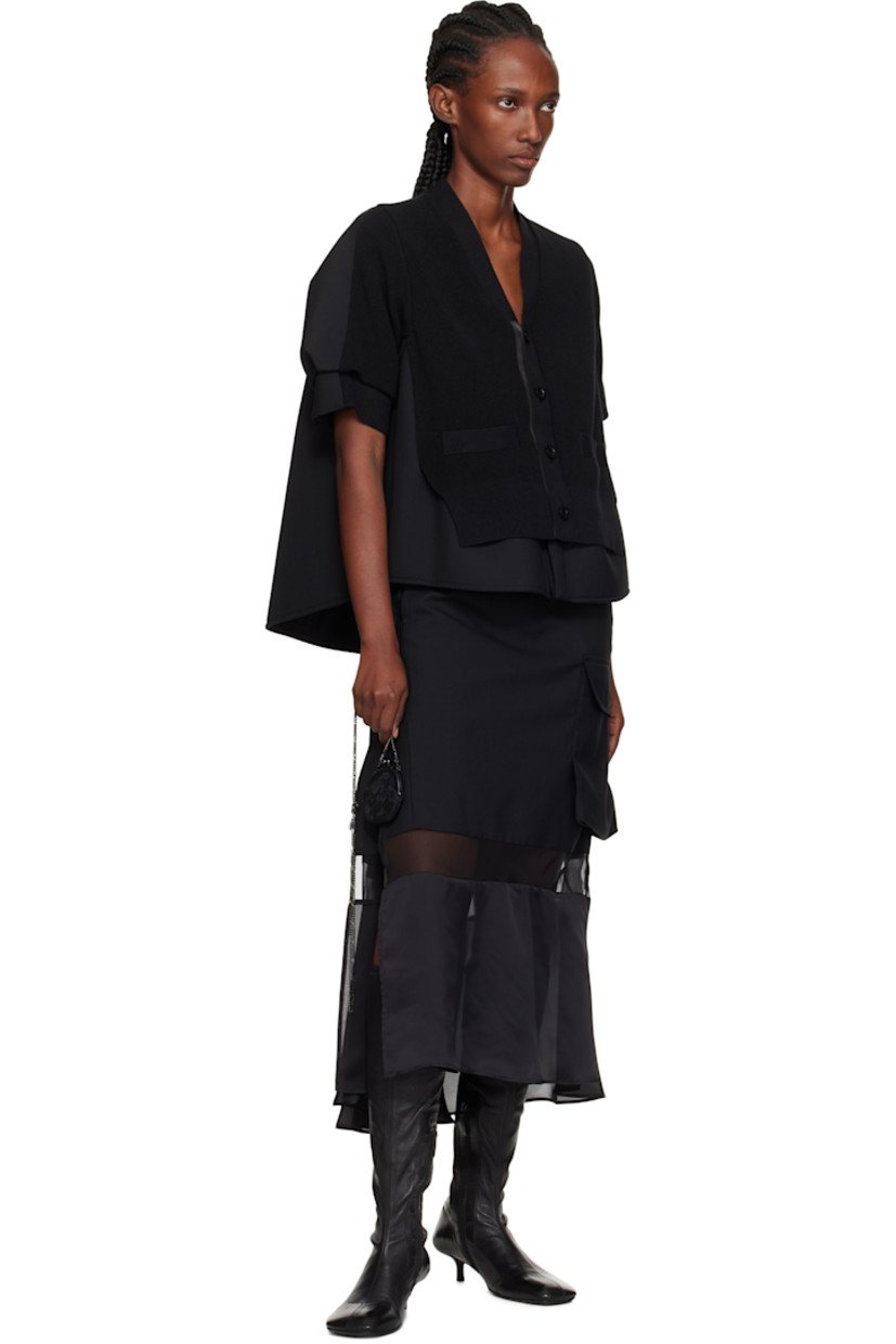 Rigid and sheer embroidered lace pouch.

· Grained leather trim throughout
· Detachable curb chain carry handle
· Detachable curb chain shoulder strap
· Kiss-lock closure
· Unlined 
· H3" x W3" x D0.75"

Part of the discord YOHJI YAMAMOTO collection.

Supplier color: Black