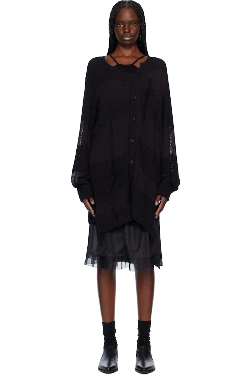 Semi-sheer knit cotton-blend cardigan. Distressing, laddering, and check pattern throughout.

· Asymmetric construction
· Partially rib-knit V-neck
· Rib-knit placket, hem, and cuffs
· Button closure
· Patch pocket
· Vented side seams and back hem
· Dropped shoulders
· Raised seam at back

Part of the Yohji Yamamoto POUR HOMME collection.

Supplier color: Black