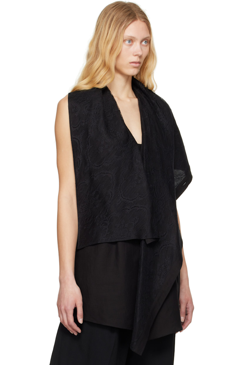 Cotton- and linen-blend broadcloth vest.

· Integrated lace scarf at V-neck
· Button closure 
· Asymmetric hem
· Cinch tabs at back 

Supplier color: Black
