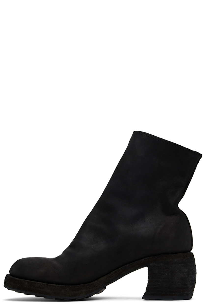 Ankle-high garment-dyed grained leather boots in black.

· Subtle distressing throughout
· Zip closure at outer side
· Stacked leather heel and midsole
· Treaded Vibram® rubber sole
· Heel: H2.25"

Part of the Yohji Yamamoto x Guidi collaboration.

Supplier color: Black