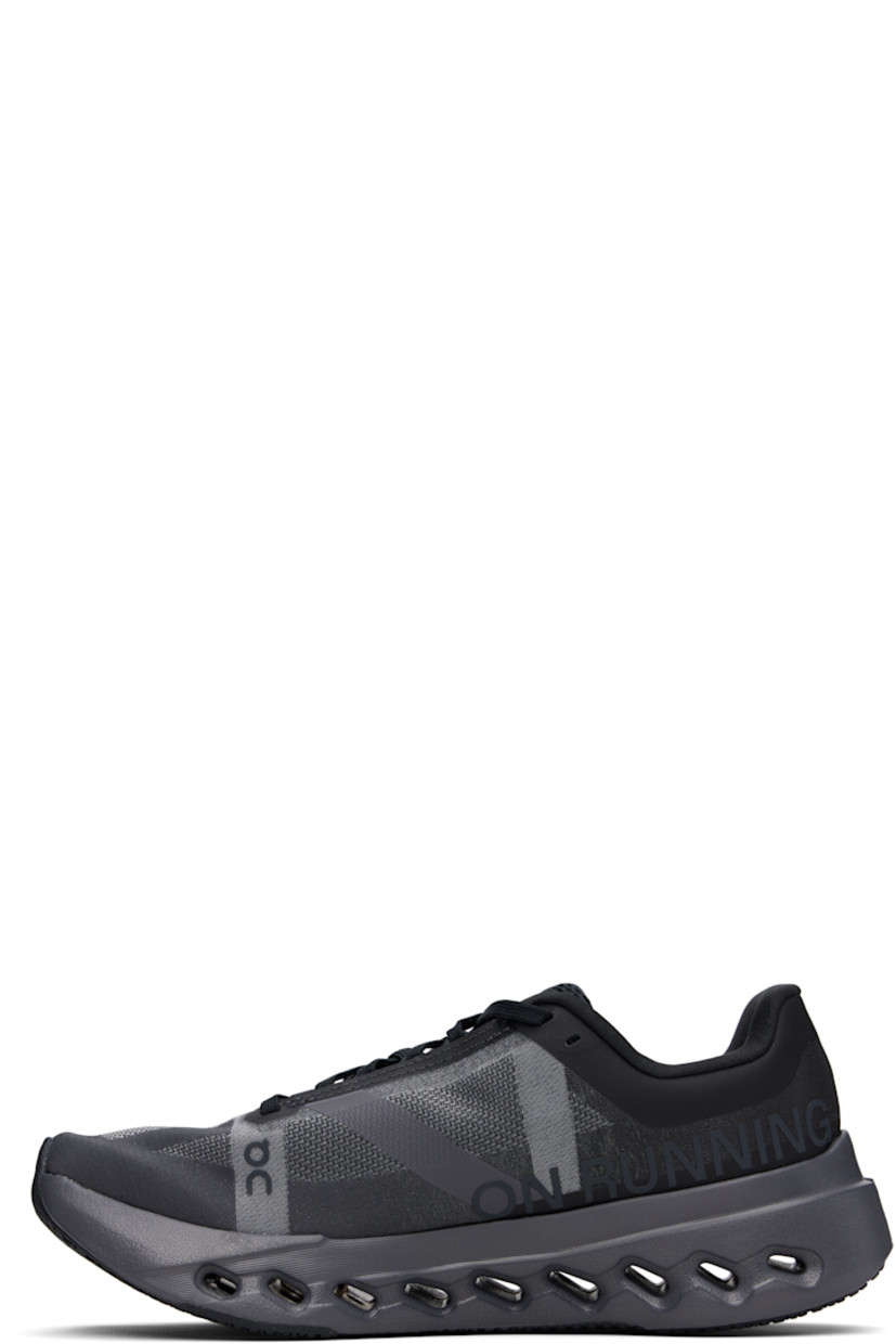 Low-top lightweight mesh and canvas sneakers in black.

· Bonded trim throughout
· Logo embossed at toe
· Lace-up closure
· Logo bonded at tongue and sides
· Padded tongue and collar
· Jersey lining
· Cushioned CloudTec Phase® Helion™ foam rubber midsole
· Treaded rubber sole

Supplier color: Black/Eclipse