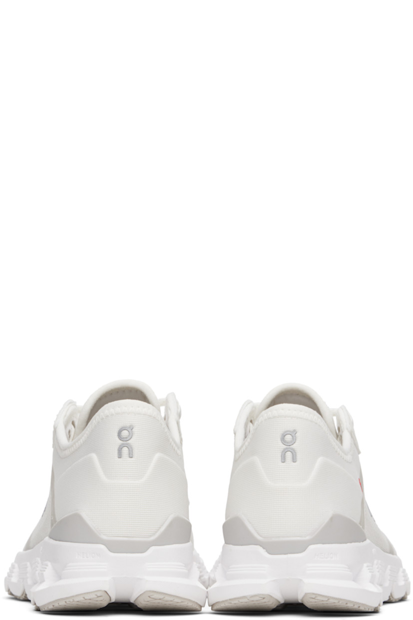 Low-top lightweight recycled mesh sneakers in off-white.

· Bonded trim throughout
· Lace-up closure
· Logo printed at tongue
· Padded collar
· Reflective logo bonded at sides and heel
· Text printed at outer side
· Jersey lining
· CloudTec® foam rubber midsole
· Treaded Speedboard™ rubber sole

Supplier color: White/Wolf