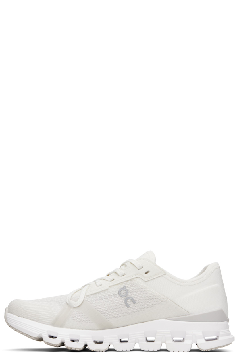 Low-top lightweight recycled mesh sneakers in off-white.

· Bonded trim throughout
· Lace-up closure
· Logo printed at tongue
· Padded collar
· Reflective logo bonded at sides and heel
· Text printed at outer side
· Jersey lining
· CloudTec® foam rubber midsole
· Treaded Speedboard™ rubber sole

Supplier color: White/Wolf
