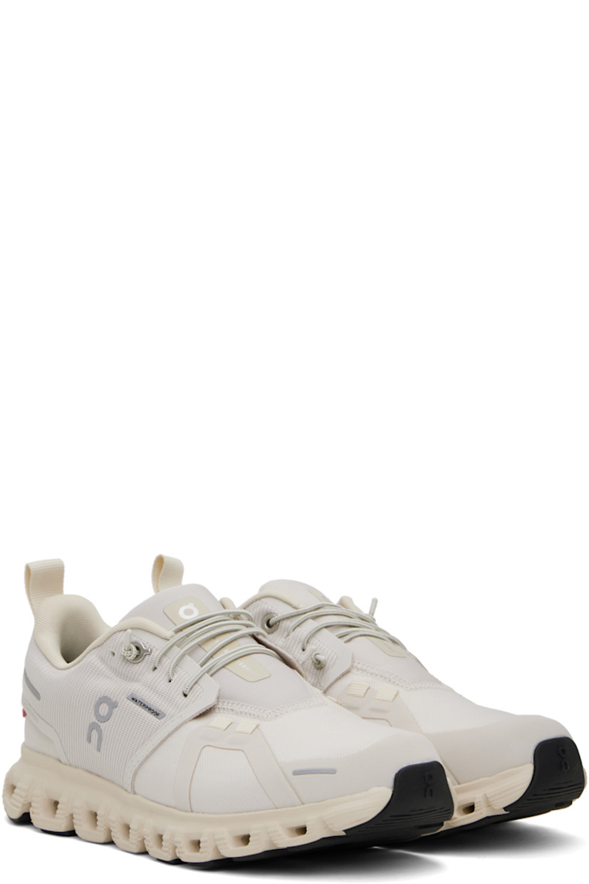 Low-top knit recycled polyester and mesh slip-on sneakers in beige.

· Waterproof and dope-dyed
· Bonded trim throughout
· Elasticized lace-up closure
· Logo patch at padded tongue
· Padded collar
· Logo and reflective trim bonded at sides
· Logo-bonded pull-loop at heel tab
· Mesh lining
· Zero-Gravity CloudTec® foam rubber midsole
· Treaded Speedboard™ rubber sole

Supplier color: Pearl/Cream
