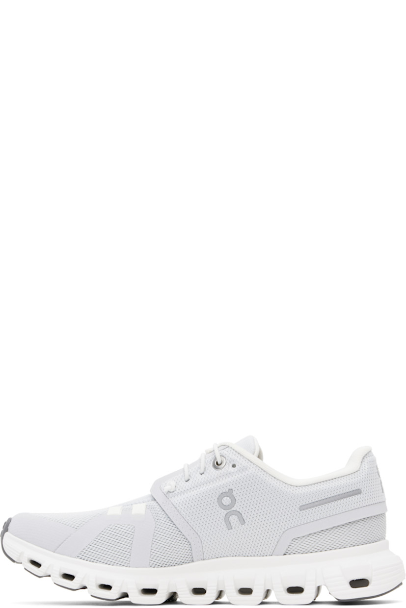 Low-top mesh sneakers in gray.

· Reflective and bonded trim throughout
· Elasticized lace-up closure
· Logo printed at padded tongue 
· Padded collar
· Logo bonded at sides and heel
· Jersey lining
· Zero-Gravity CloudTec® foam rubber midsole
· Speedboard® at treaded rubber sole

Supplier color: Glacier/White