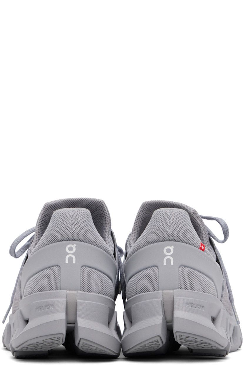 Low-top water-repellent mesh sneakers in gray.

· Logo embossed at toe 
· Lace-up closure
· Padded tongue and collar
· Logo bonded at sides and heel counter
· Logo flag at outer side
· Jersey lining
· Cushioned CloudTec® Helion™ foam rubber midsole
· Treaded Speedboard® rubber sole

Supplier color: Alloy/Forst