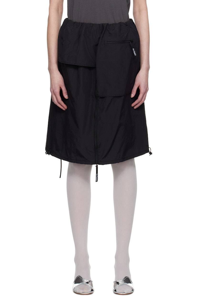 Nylon taffeta midi skirt.

· Layered and asymmetrical construction
· Elasticized waistband
· Four-pocket styling
· Zip closure at front
· Bungee-style drawstring at hem
· Full taffeta lining

Supplier color: Black