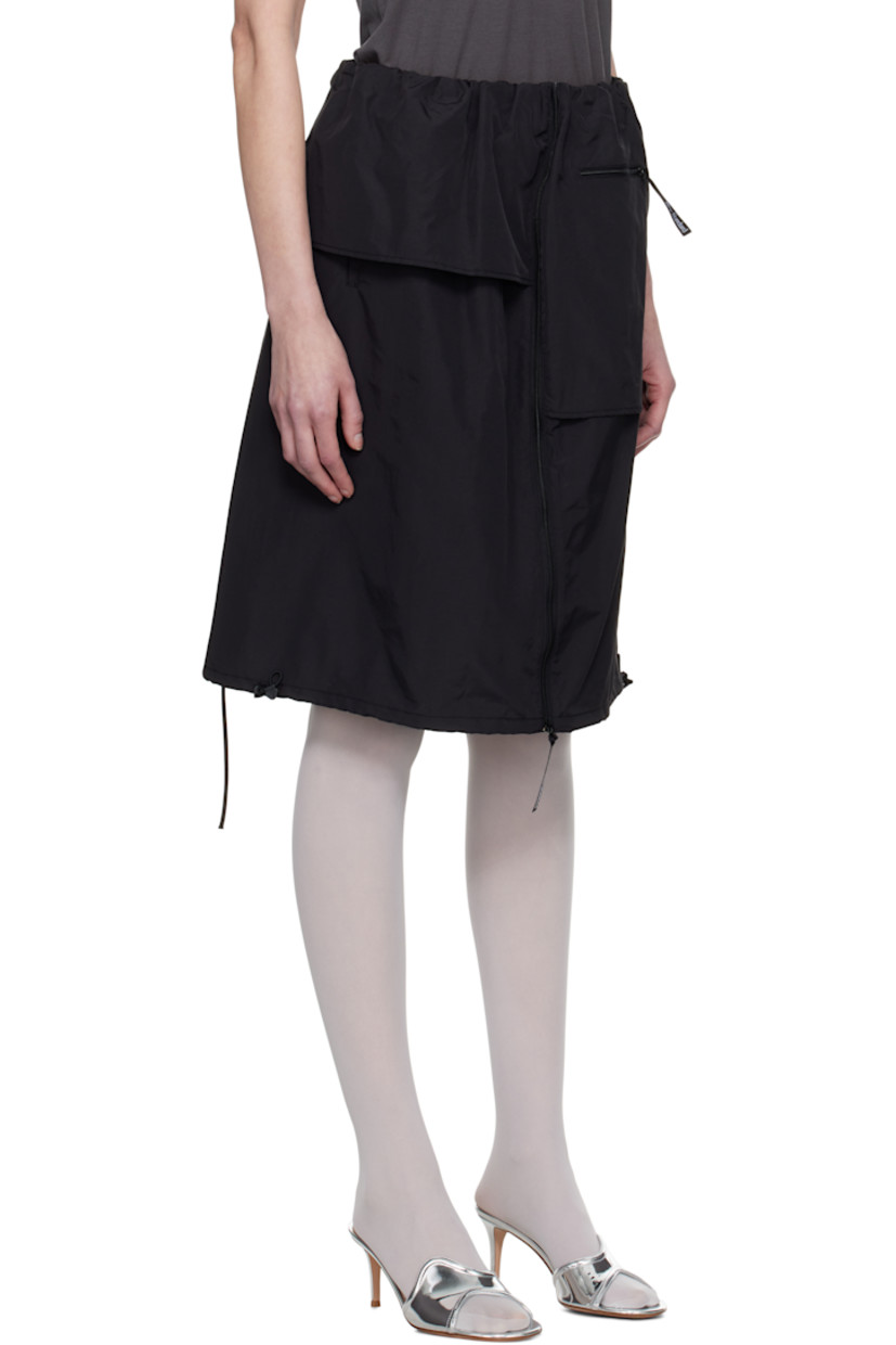 Nylon taffeta midi skirt.

· Layered and asymmetrical construction
· Elasticized waistband
· Four-pocket styling
· Zip closure at front
· Bungee-style drawstring at hem
· Full taffeta lining

Supplier color: Black