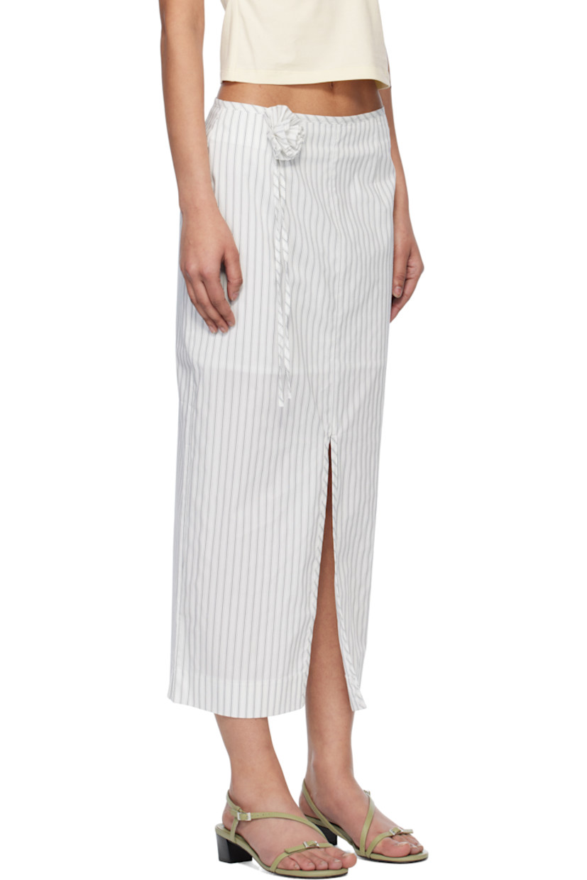 Stretch cotton-blend poplin maxi skirt. Stripes and embroidered detailing throughout. 

· Floral appliqué and extended trim at front
· Slit at hem
· Concealed zip closure at back
· Partial sateen lining

Supplier color: Off-white stripe