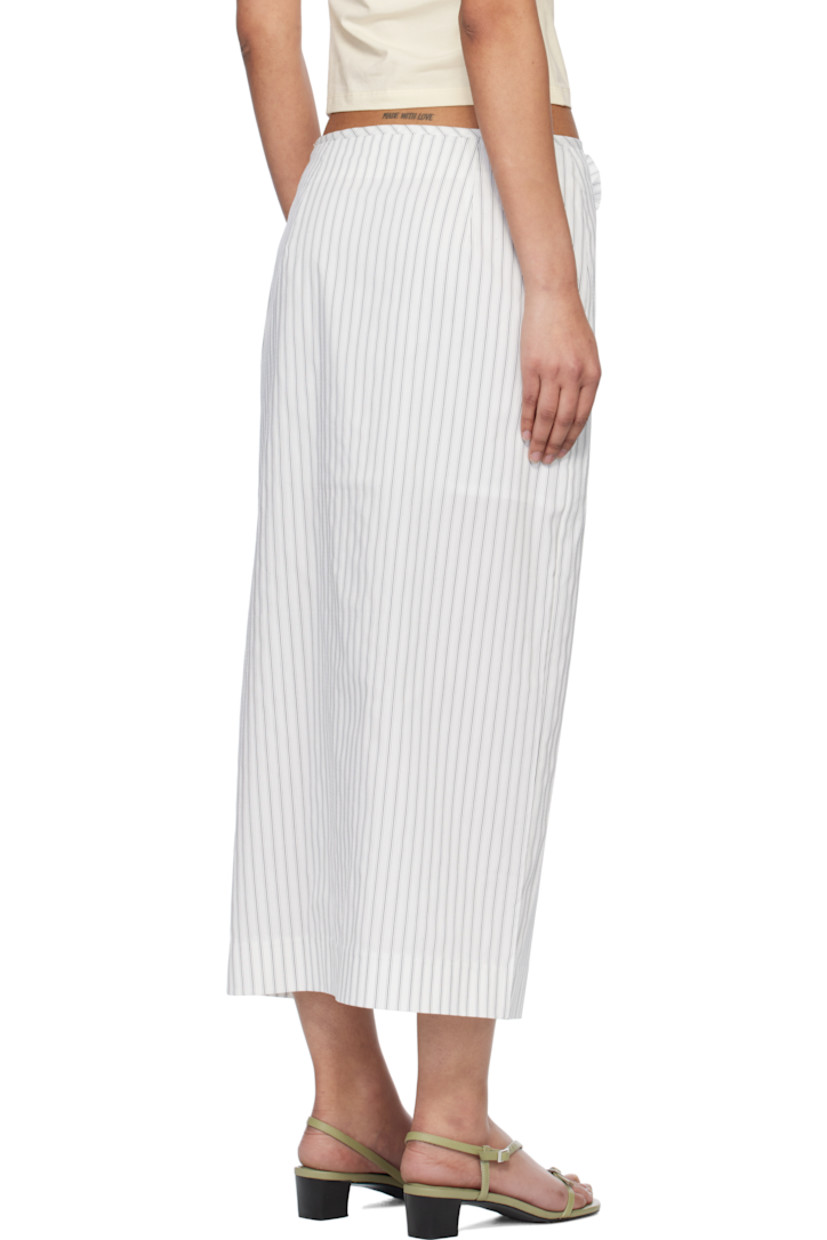 Stretch cotton-blend poplin maxi skirt. Stripes and embroidered detailing throughout. 

· Floral appliqué and extended trim at front
· Slit at hem
· Concealed zip closure at back
· Partial sateen lining

Supplier color: Off-white stripe