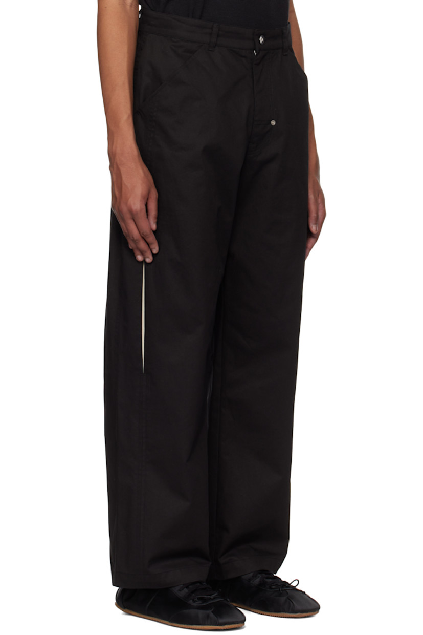 Cotton twill trousers.

· Belt loops
· Four-pocket styling
· Zip fly
· Rivet at fly
· Slit at legs
· Logo patch at back pocket

Supplier color: Black/Cream