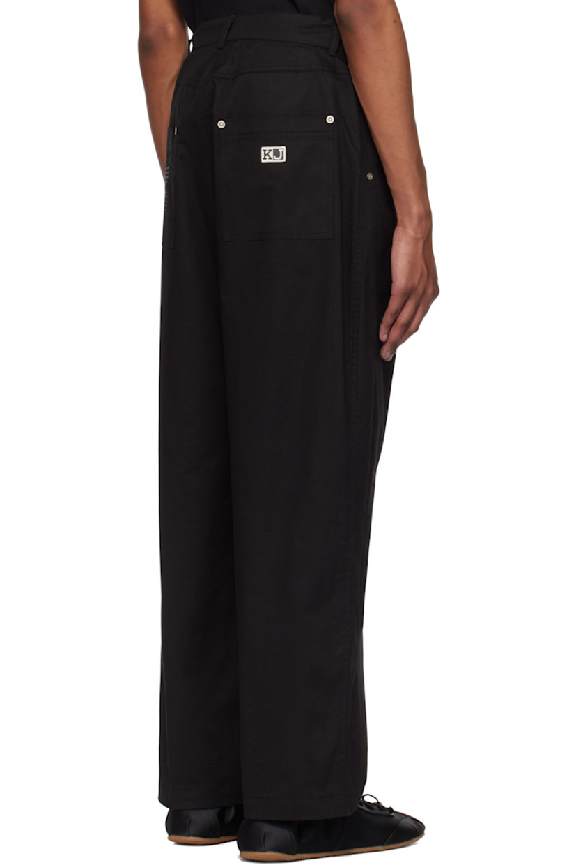 Cotton twill trousers.

· Belt loops
· Four-pocket styling
· Zip fly
· Rivet at fly
· Slit at legs
· Logo patch at back pocket

Supplier color: Black/Cream