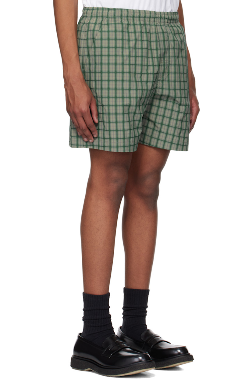 Polyester twill shorts. Check pattern throughout.

· Concealed drawstring at elasticized waistband
· Four-pocket styling
· Mock fly
· Logo and text embroidered at leg
· Logo patch at back pocket

Supplier color: Green