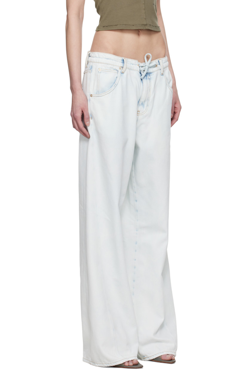 Relaxed-fit non-stretch cotton-blend denim jeans. Fading and subtle distressing throughout.

· Belt loops and drawstring at waistband
· Five-pocket styling
· Zip-fly
· Twisted outseams
· Logo patch at back waistband
· Contrast stitching in tan

Supplier color: Ice blue