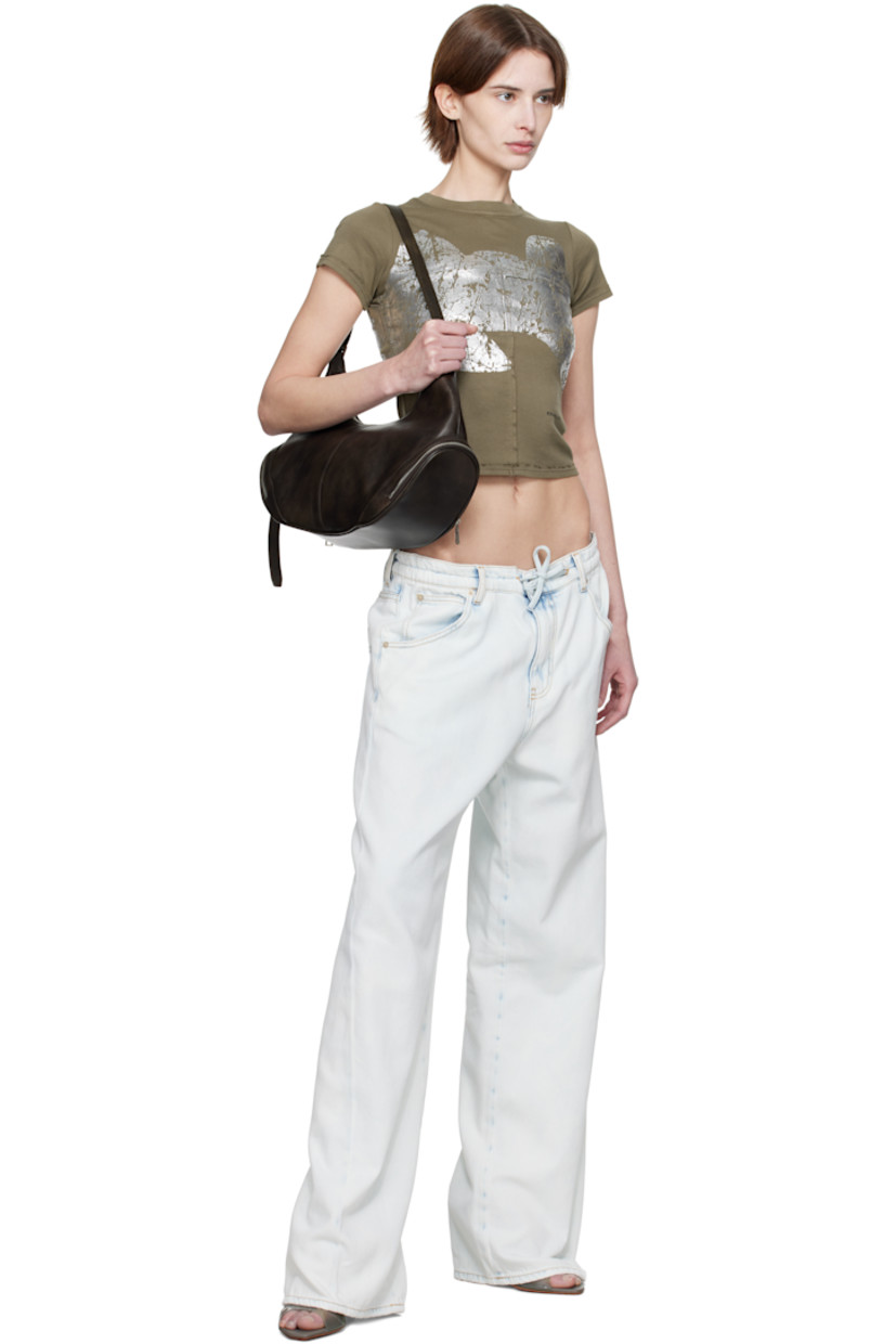 Relaxed-fit non-stretch cotton-blend denim jeans. Fading and subtle distressing throughout.

· Belt loops and drawstring at waistband
· Five-pocket styling
· Zip-fly
· Twisted outseams
· Logo patch at back waistband
· Contrast stitching in tan

Supplier color: Ice blue