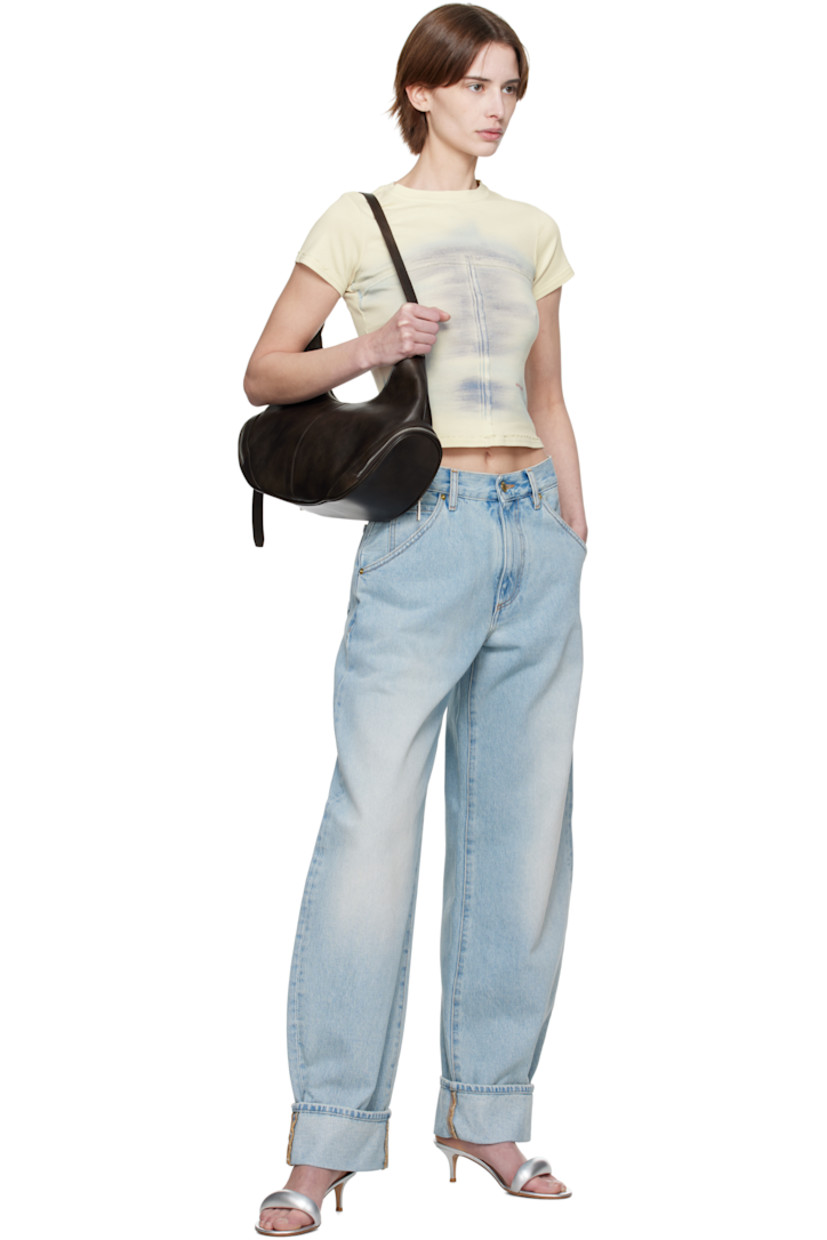 Loose-fit non-stretch denim jeans. Fading throughout.

· Belt loops
· Five-pocket styling
· Zip fly
· Rolled cuffs
· Curved outseams
· Logo patch at back waistband

Supplier color: Lil light