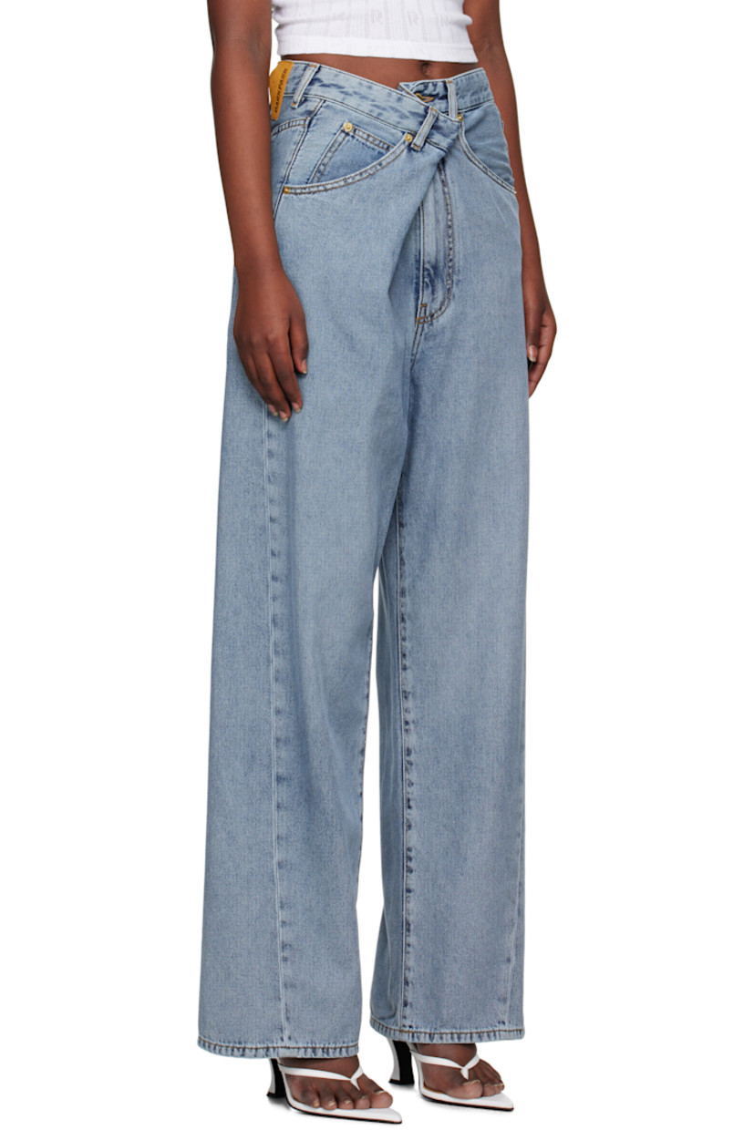 Stretch denim jeans. Fading throughout.

· Belt loops
· Offset hook-eye fastening at waistband
· Five-pocket styling
· Zip-fly
· Dropped inseam
· Leather logo patch at back waistband
· Logo-engraved gold-tone hardware
· Contrast stitching in tan

Supplier color: San fran blue