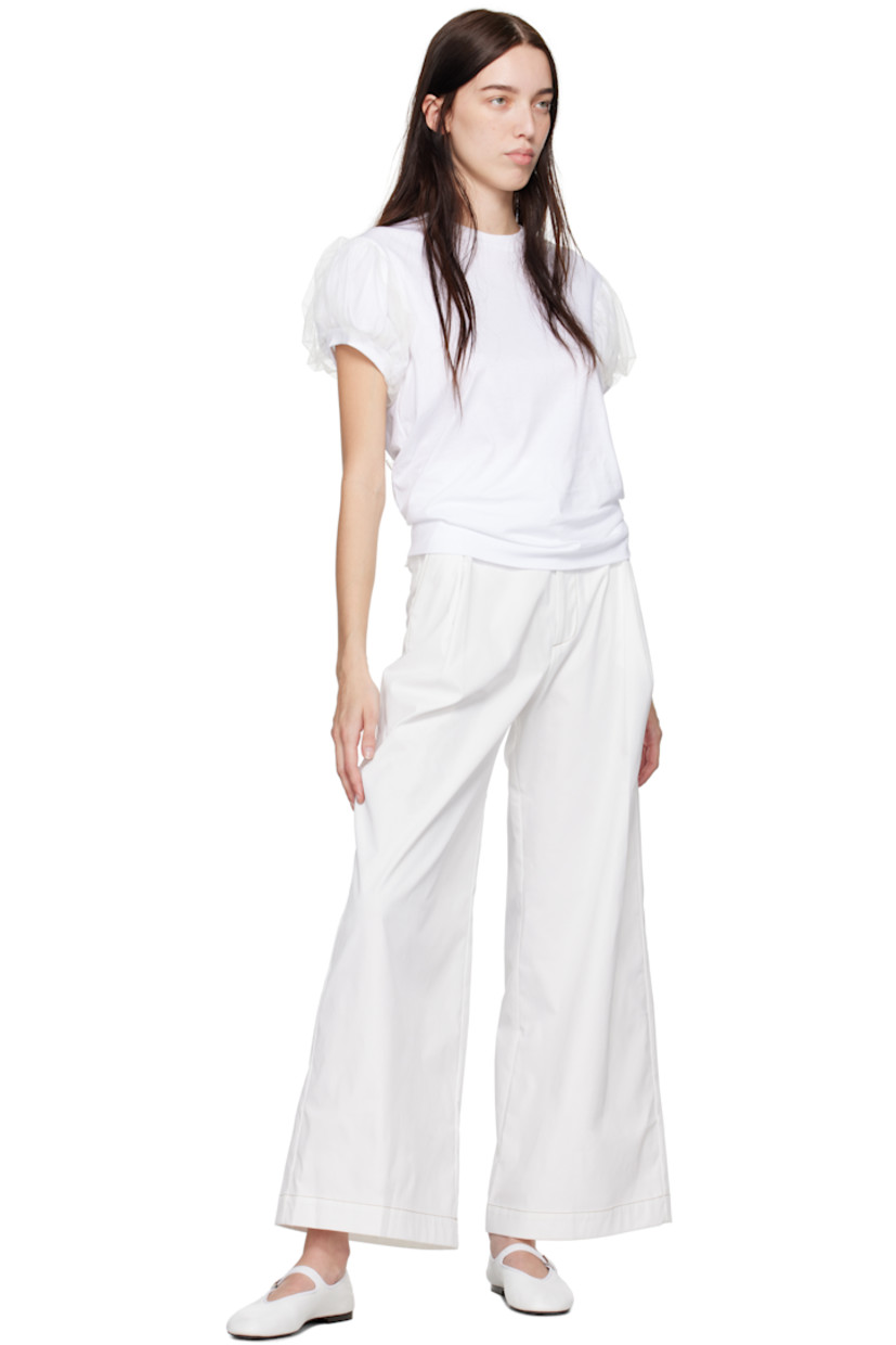 Wide-leg polyester twill trousers. 

· Belt loops
· Four-pocket styling
· Zip-fly
· Pleats at front

Supplier color: White