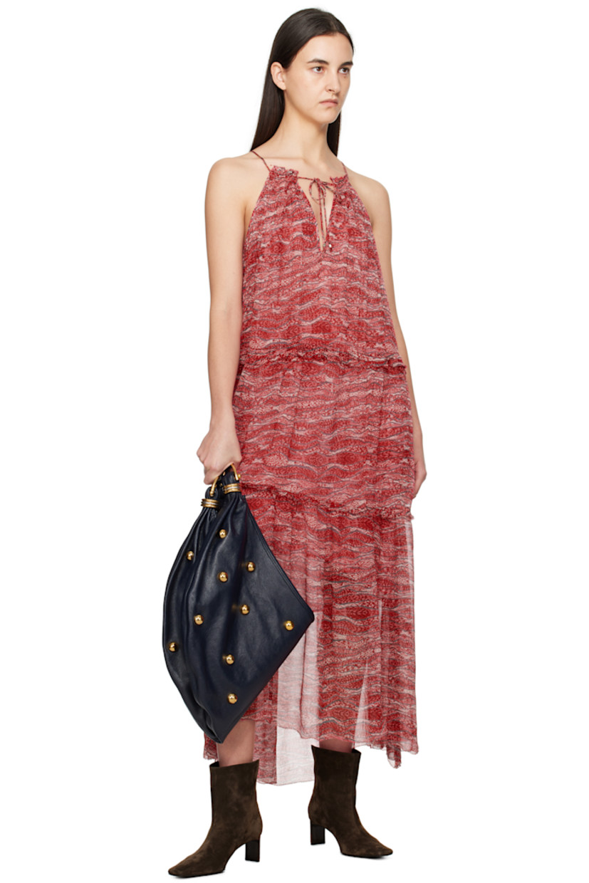 Lightweight semi-sheer viscose chiffon maxi dress. Gathering and graphic pattern printed throughout.

· Tiered construction
· Plunging V-neck
· Drawstring at elasticized waist
· Asymmetric raw hem
· Self-tie halter strap
· Full viscose gauze lining

Supplier color: Red