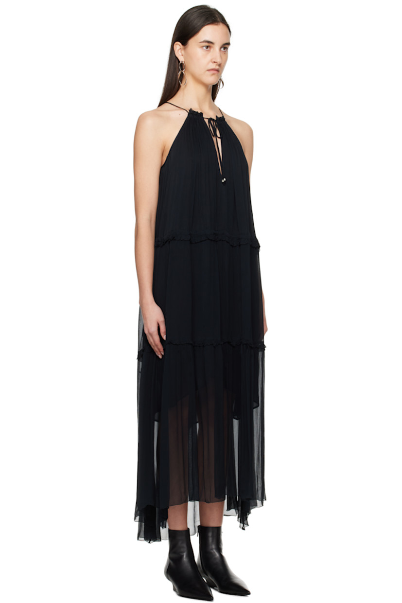 Lightweight semi-sheer viscose chiffon maxi dress. Gathering and graphic pattern printed throughout.

· Tiered construction
· Plunging V-neck
· Drawstring at elasticized waist
· Asymmetric raw hem
· Self-tie halter strap
· Full viscose gauze lining

Supplier color: Black