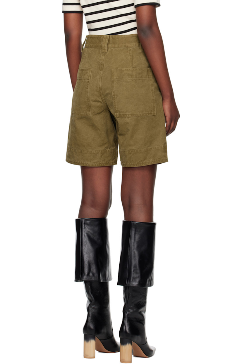 Treated cotton canvas shorts. Fading throughout. 

· Belt loops
· Four-pocket styling
· Zip fly 
· Pleats at front 

Supplier color: Light bronze