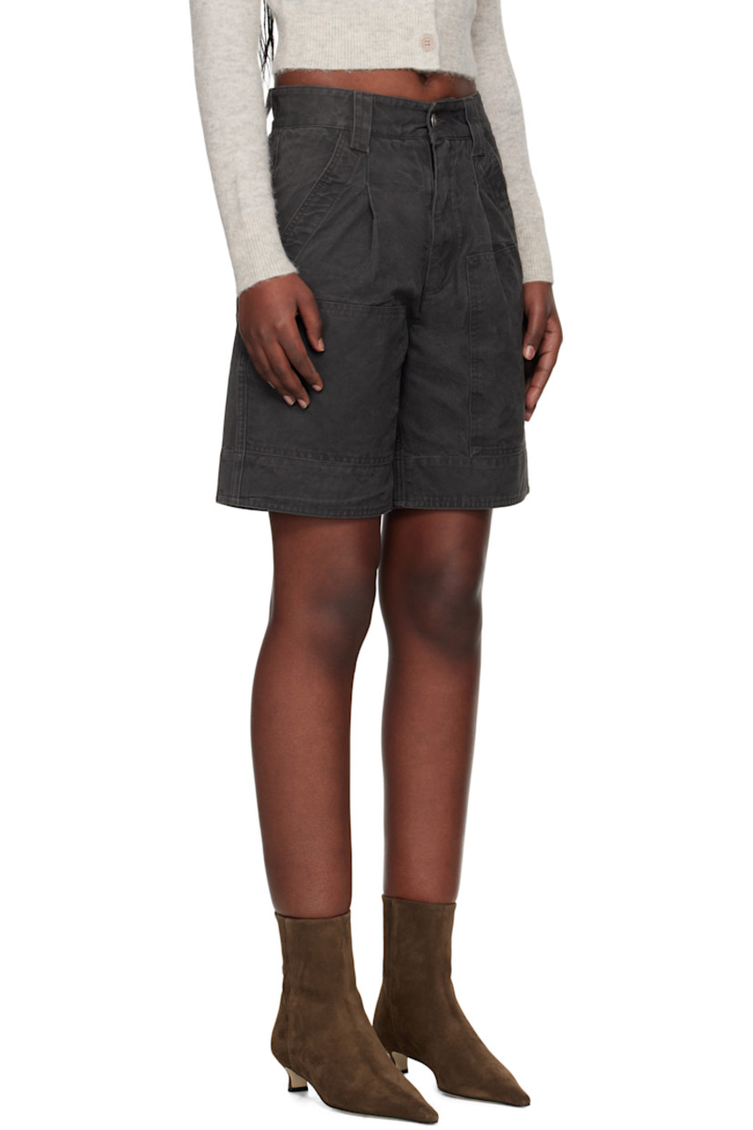 Treated cotton canvas shorts. Fading throughout. 

· Belt loops
· Four-pocket styling
· Zip fly 
· Pleats at front 

Supplier color: Faded black