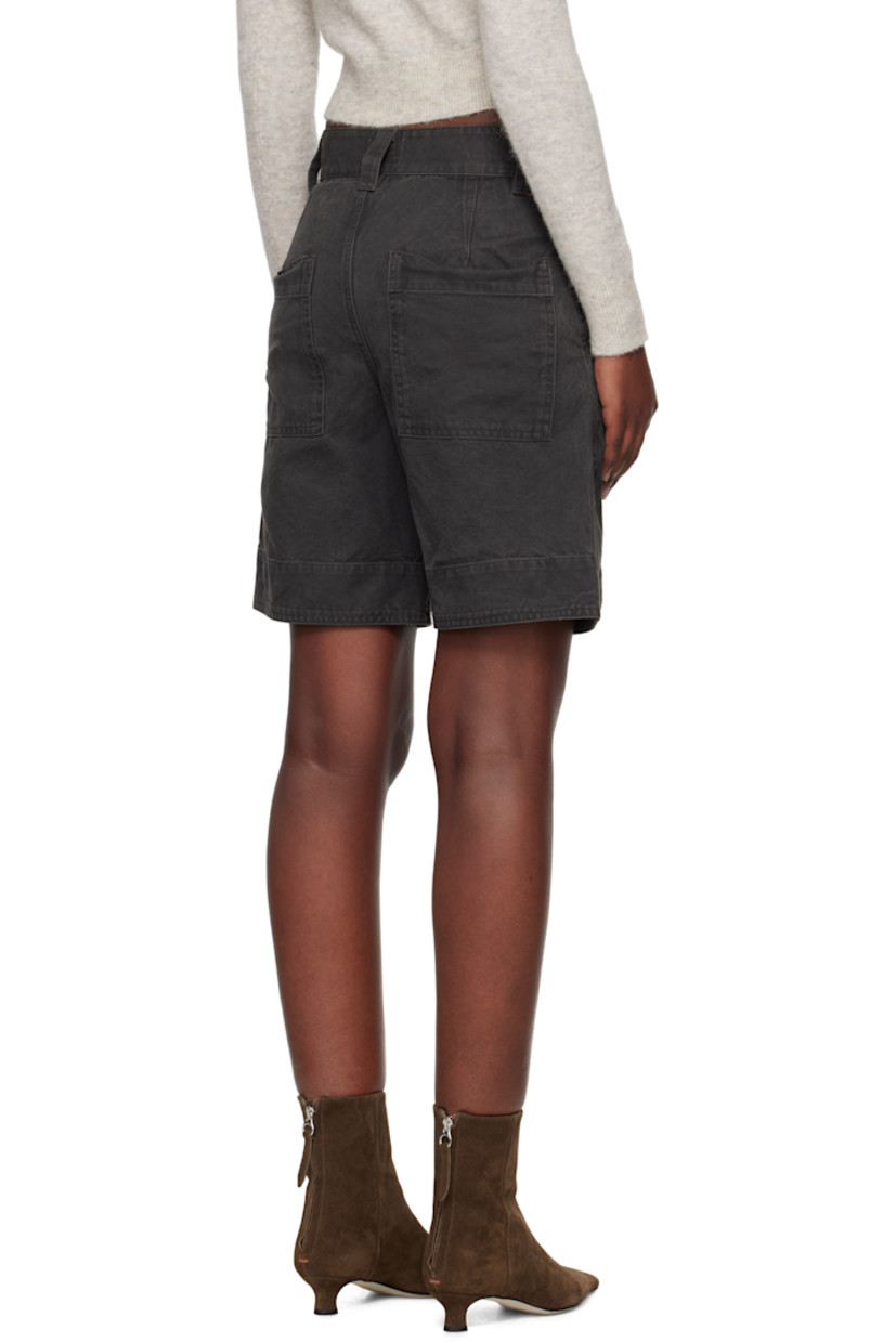 Treated cotton canvas shorts. Fading throughout. 

· Belt loops
· Four-pocket styling
· Zip fly 
· Pleats at front 

Supplier color: Faded black