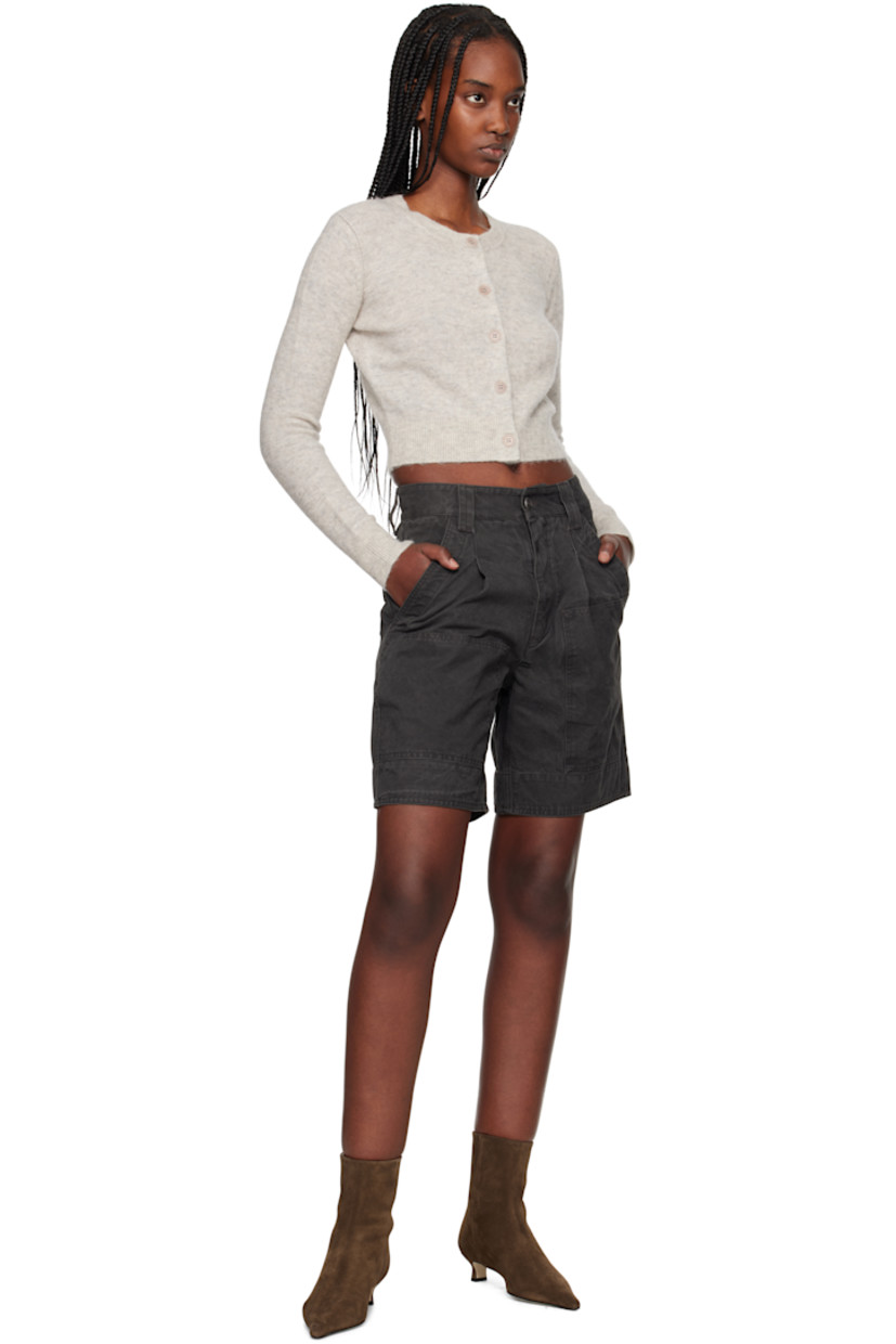 Treated cotton canvas shorts. Fading throughout. 

· Belt loops
· Four-pocket styling
· Zip fly 
· Pleats at front 

Supplier color: Faded black