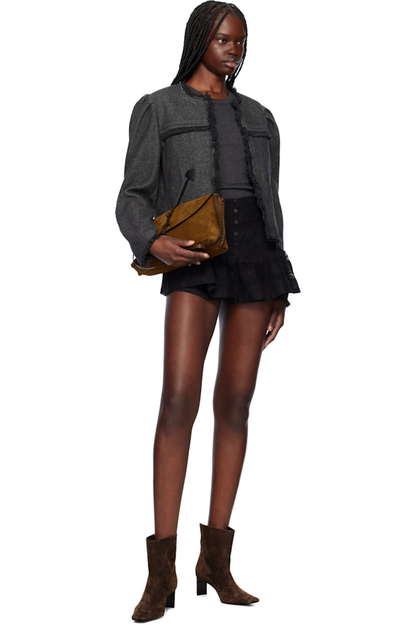 Cotton voile miniskirt. Lace trim and embroidered detailing throughout.

· Button closure
· Gathering at flared hem
· Integrated short-style underlay

Supplier color: Black