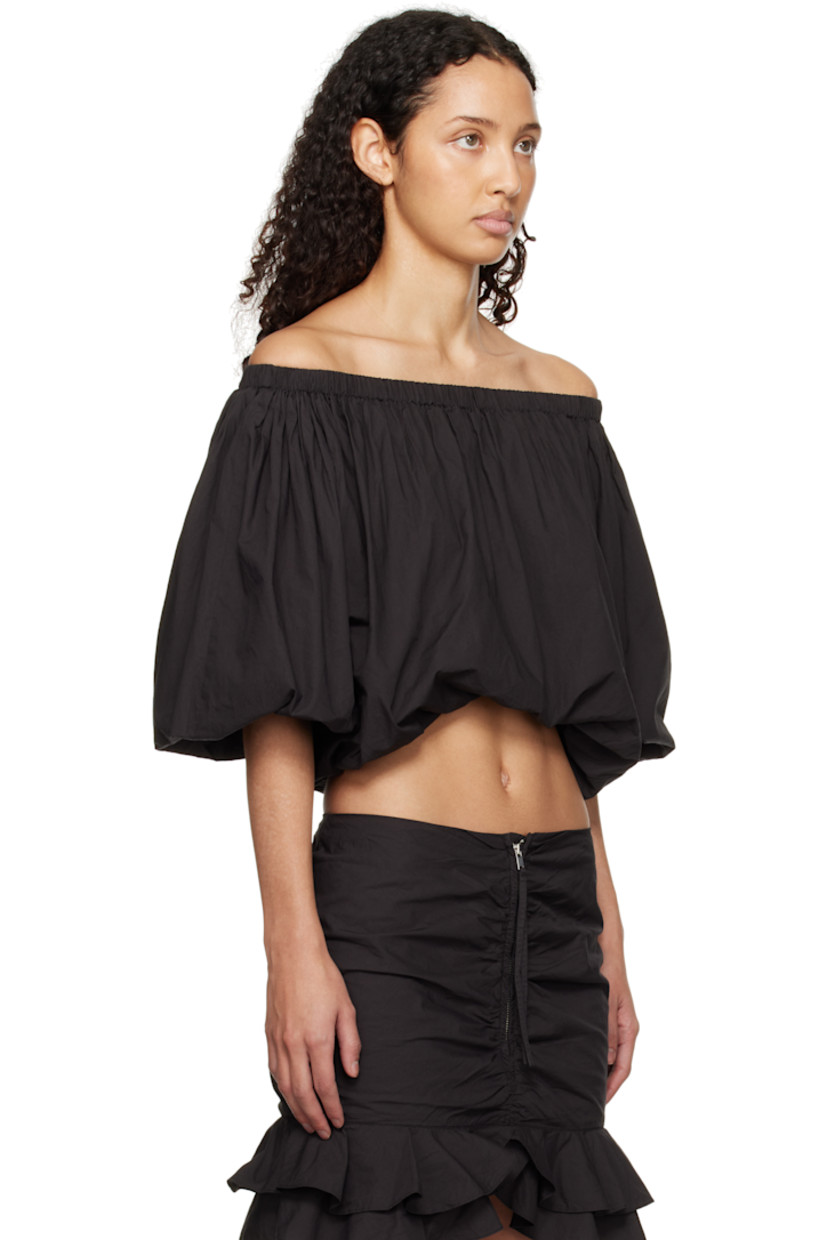 Organic cotton poplin blouse. Gathering throughout.

· Off-the-shoulder construction
· Elasticized neck, hem, and cuffs

Supplier color: Black