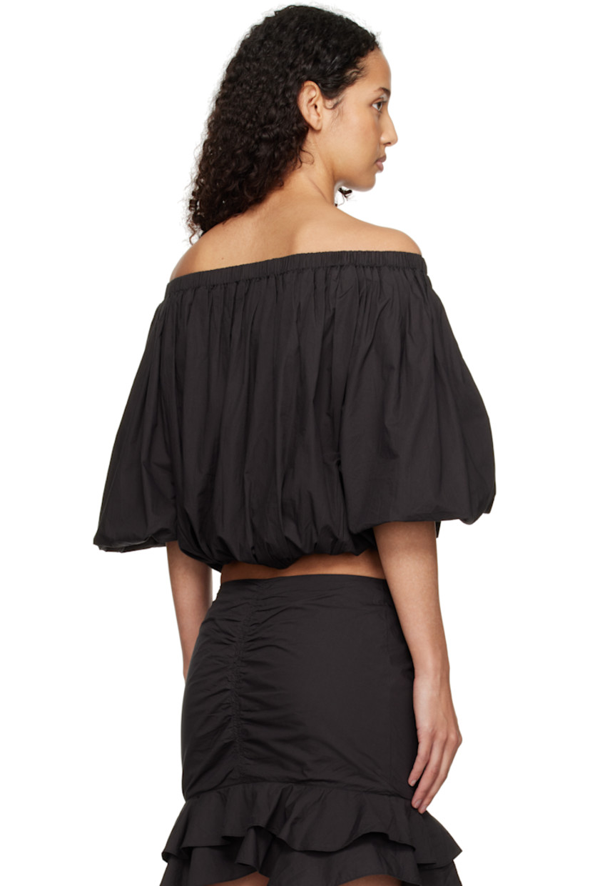 Organic cotton poplin blouse. Gathering throughout.

· Off-the-shoulder construction
· Elasticized neck, hem, and cuffs

Supplier color: Black