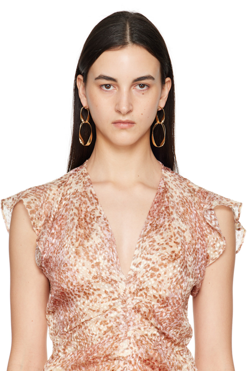 Pair of drop earrings in gold-tone brass. Twisted detailing throughout.

· Post-stud fastening
· H3" x W1"

Supplier color: Gold