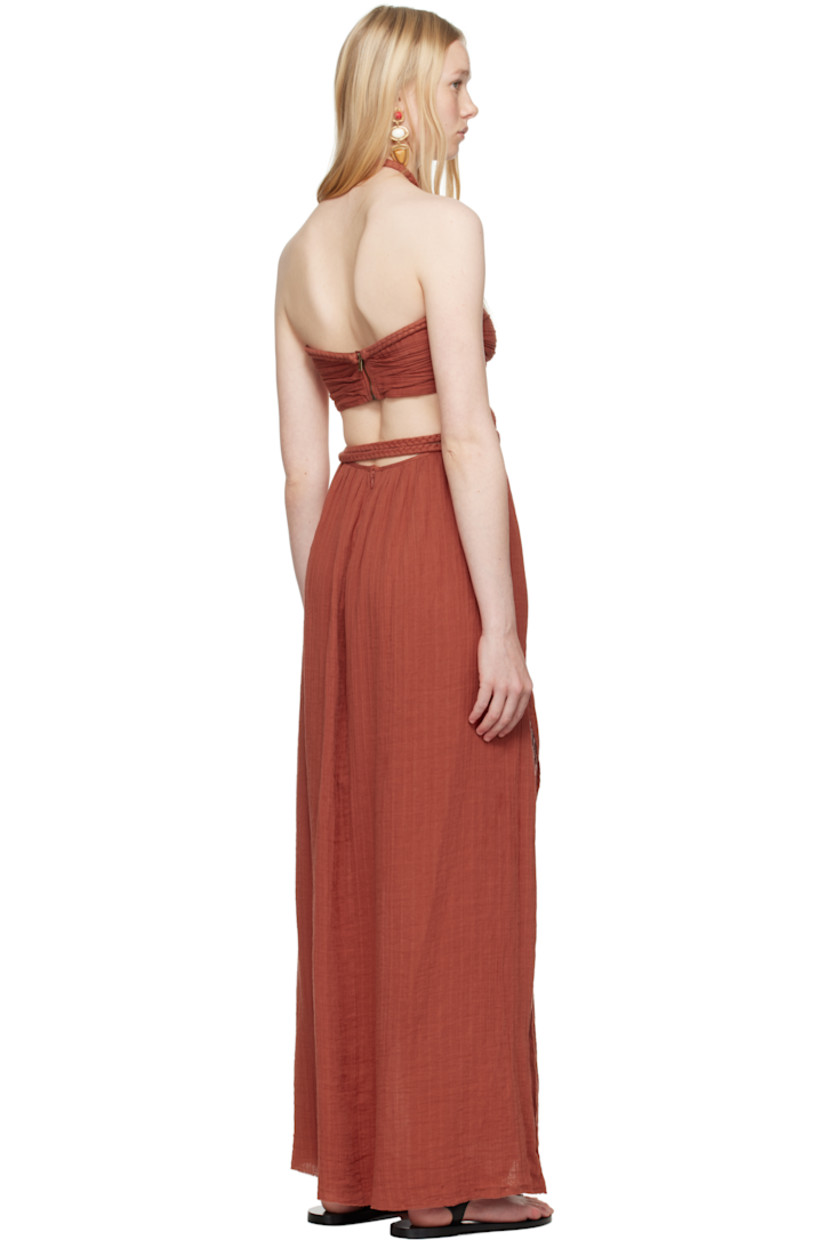 Organic cotton gauze maxi dress. Braided trim throughout.

· Adjustable button fastening at halter neck
· Hardware at chest
· Integrated self-tie cord belt at waist
· Cutout at side seams and back
· Seam pockets at waist
· Slit at side seams
· Zip closure at back
· Full silk crêpe lining
· Gold-tone hardware

Supplier color: Burnt orange
