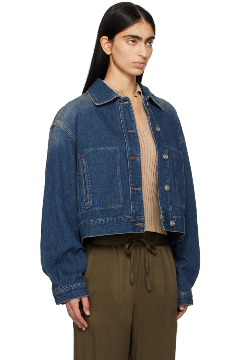 Non-stretch denim jacket. Fading throughout. 

· Spread collar
· Button closure
· Welt pockets
· Dropped shoulders
· Single-button barrel cuffs
· Adjustable button tabs and leather logo patch at back hem
· Logo-engraved silver-tone hardware
· Contrast stitching in tan

Supplier color: Faded blue