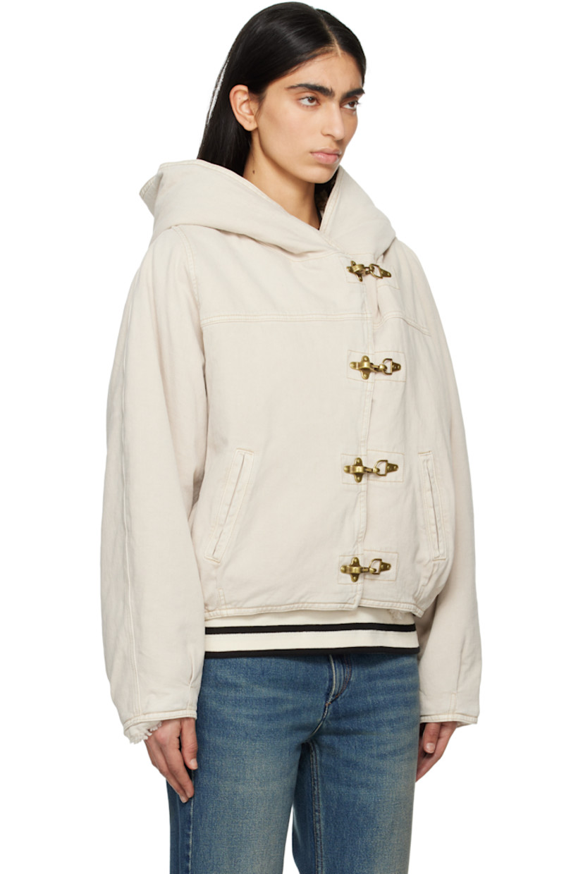 Non-stretch organic cotton- and hemp-blend denim jacket. 

· Lanyard-clasp closure
· Welt pockets
· Tucks at hem and cuffs
· Full faux-shearling lining
· Gold-tone hardware

Supplier color: Ecru