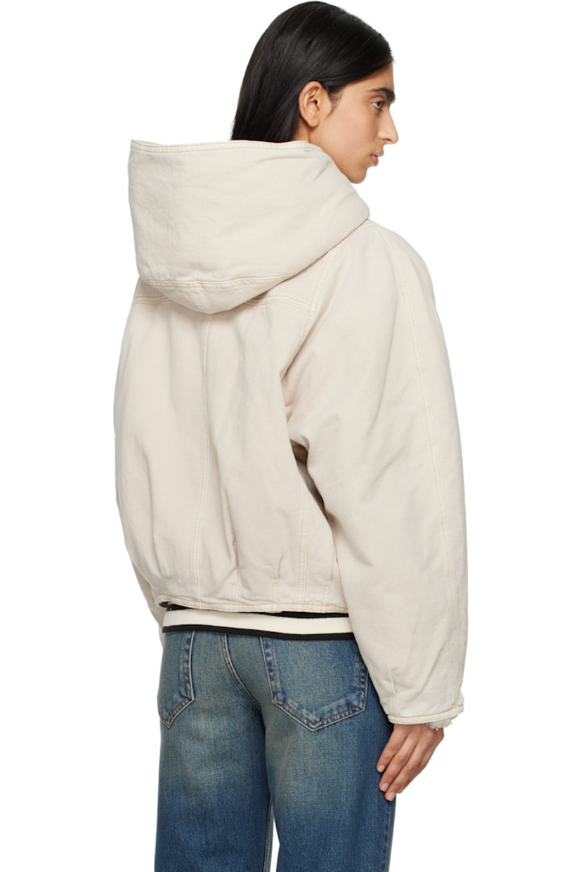 Non-stretch organic cotton- and hemp-blend denim jacket. 

· Lanyard-clasp closure
· Welt pockets
· Tucks at hem and cuffs
· Full faux-shearling lining
· Gold-tone hardware

Supplier color: Ecru