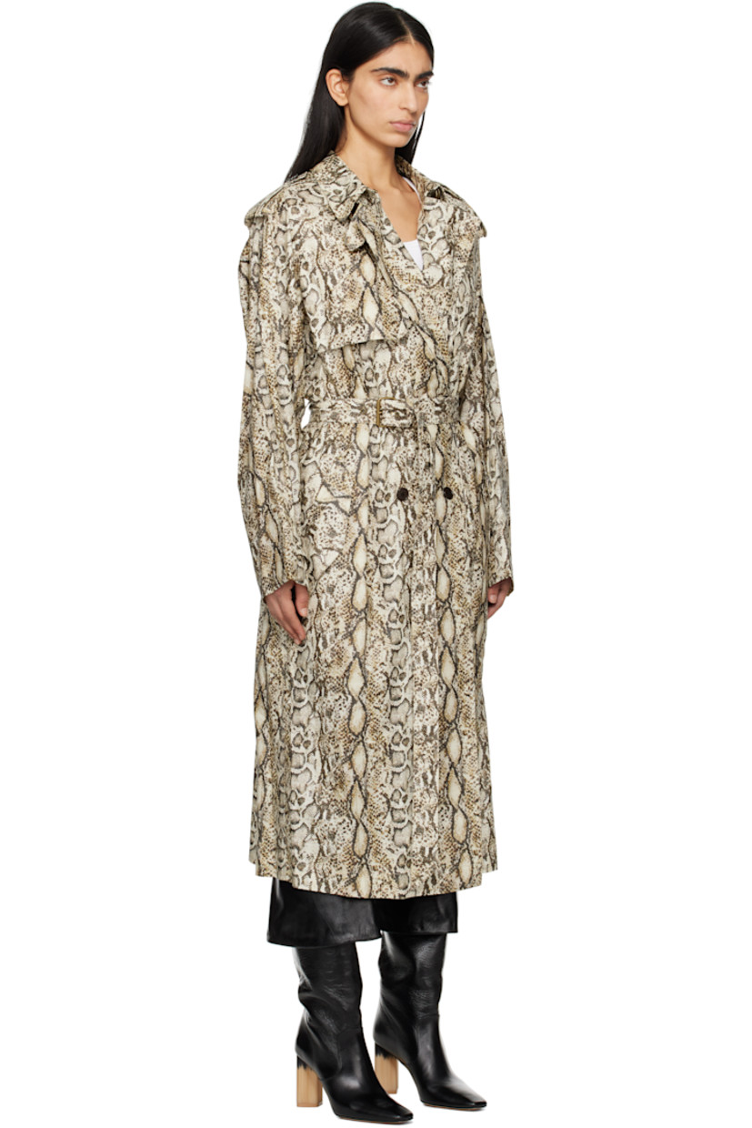 Coated plain-woven linen- and viscose-blend trench coat. Snake pattern printed throughout.

· Cinch strap at spread collar
· Double-breasted button closure
· Storm flap at front and back
· Flap pockets
· Detachable pin-buckle belt and belt loops
· Epaulets
· Button tab at cuffs
· Central vent at back hem

Supplier color: Natural