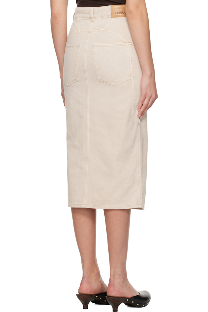 Non-stretch cotton- and hemp-blend denim midi skirt.

· Paneled construction
· Belt loops
· Six-pocket styling
· Zip-fly
· Central vent at front hem
· Leather logo patch at back waistband
· Logo-engraved bronze-tone hardware

Supplier color: Ecru